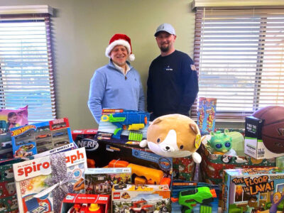 Brian McCarthy and TJ McVey celebrating the holidays with a toy drive